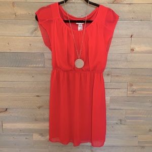 Pink dress with cap sleeves and cinch waist